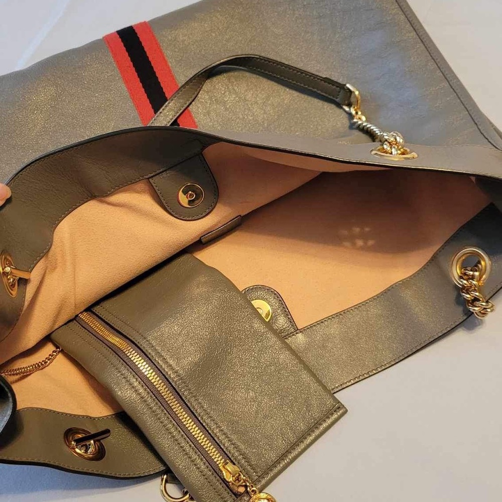 Detachable chain shoulder strap. Color: Gray. Made in Italy. Gold-tone hardware.